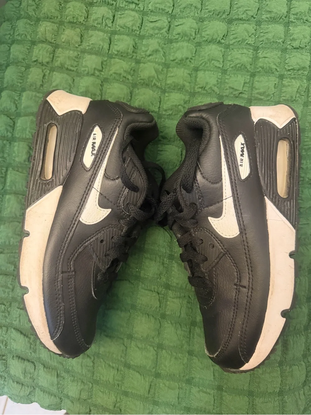 Nike Kids Black Sneakers with White Swoosh Accent